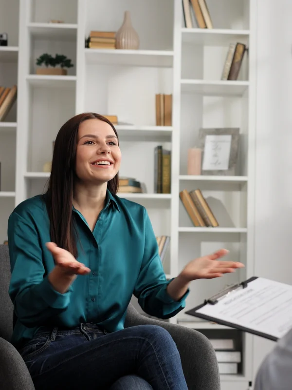Cognitive Behavioral Therapy. A young woman speaks with her therapist during Attachment-Based Therapy Calgary