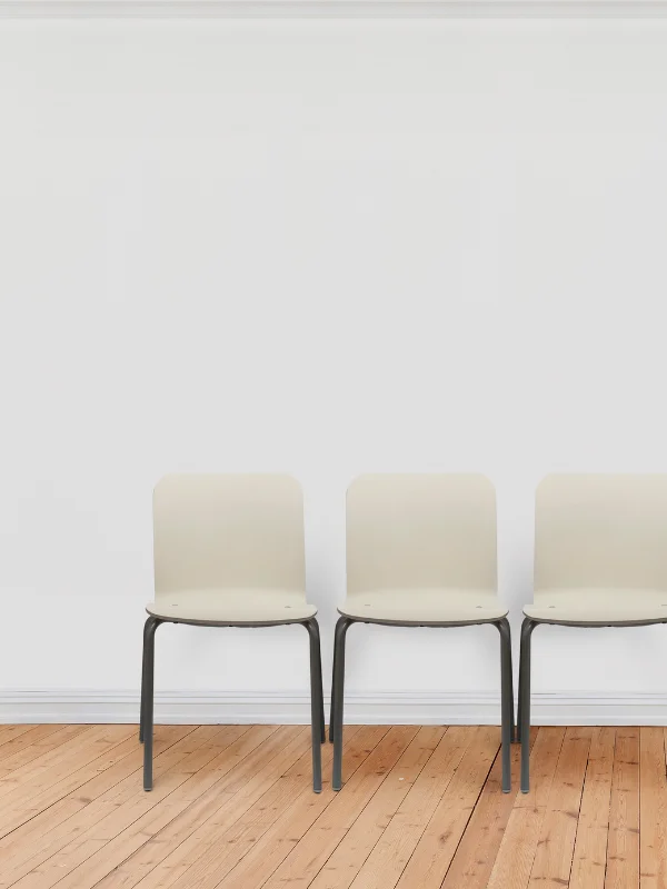 Attachment-Based Therapy Calgary - Three white chairs line the therapist's waiting room.