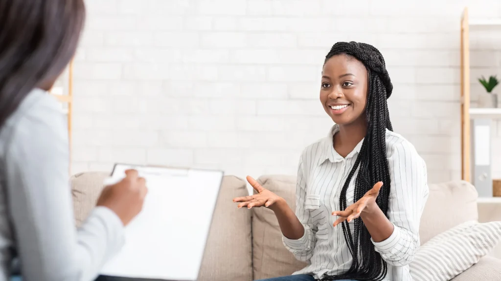 A therapist and her client talk during Cognitive Behavioural Therapy in Calgary