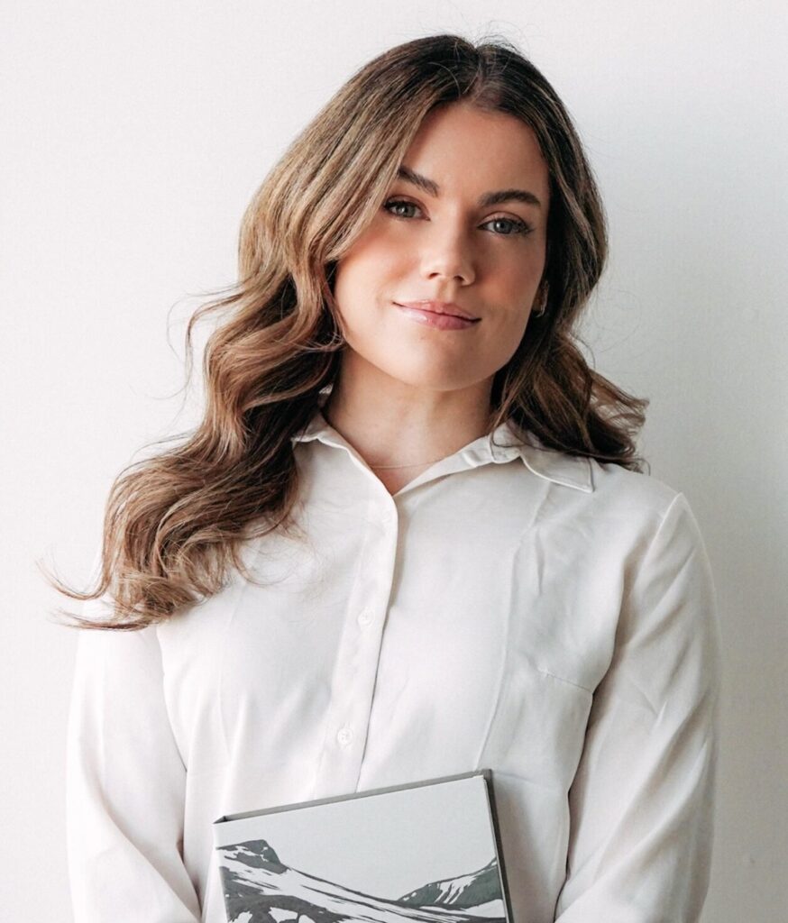 About the Image of Psychologist Beverly Reed standing at her mental health counselling office in Calgary Alberta.